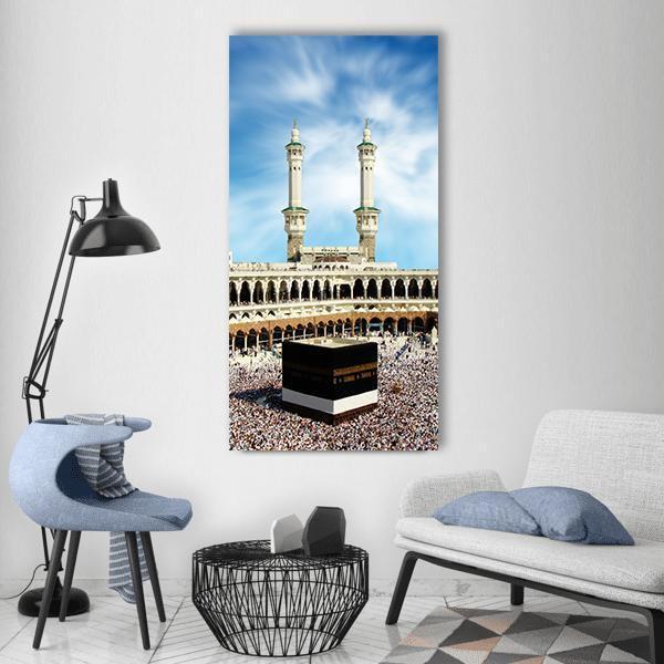 Kaaba at Masjid Al-haram, Mecca Vertical Canvas Wall Art in black, white and blue, single vertical panel hung on a wall