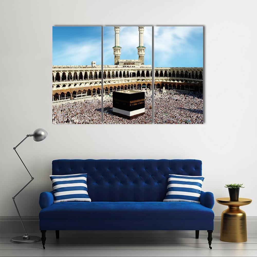 Kaaba at Masjid Al-haram, Mecca Canvas Wall Art in white, beige and blue, 3 panel horizontal set hung on a wall