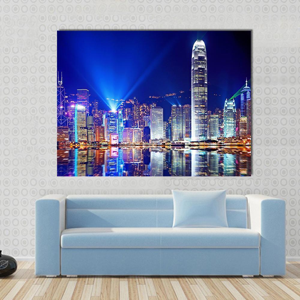 Hong Kong Island Skyline at Night Canvas Wall Art in yellow, blue and navy, single panel hung on a wall