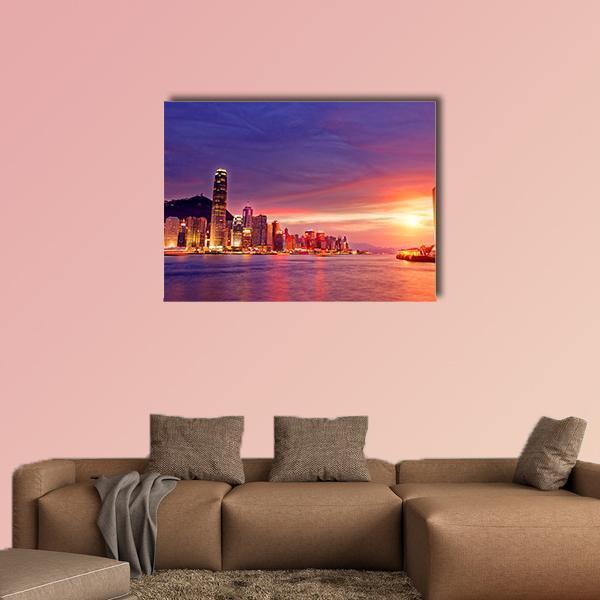 Hong Kong Cityscape at Sunset Canvas Wall Art in orange, blue and purple, single panel hung on a wall