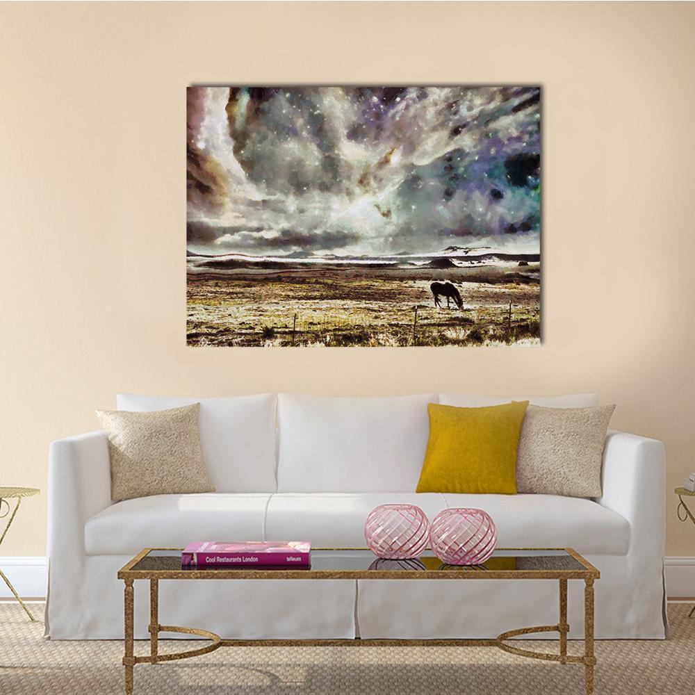 Solitary Horse Grazing Under Swirling Clouds Canvas Wall Art in gray, brown and purple, single panel hung on a wall