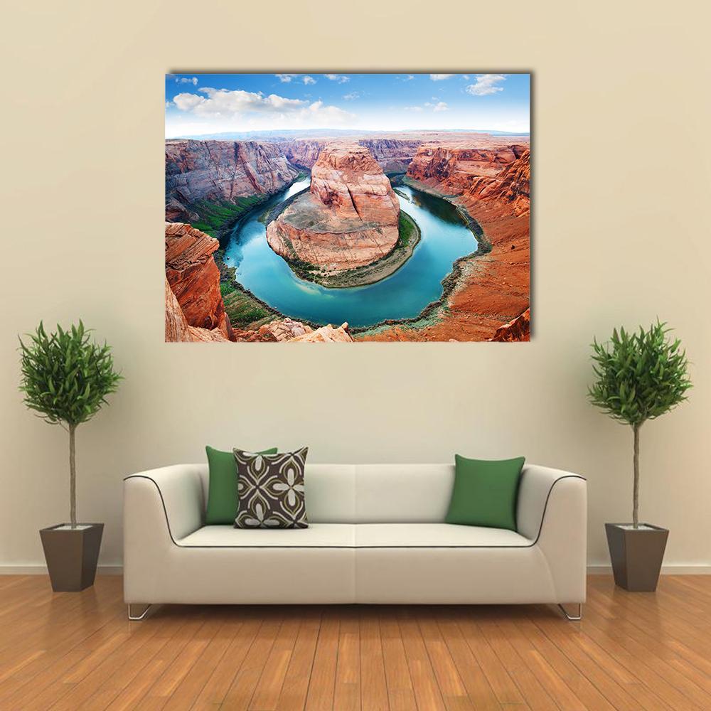 Horseshoe Bend Grand Canyon Canvas Wall Art in brown, orange and blue, single panel hung on a wall