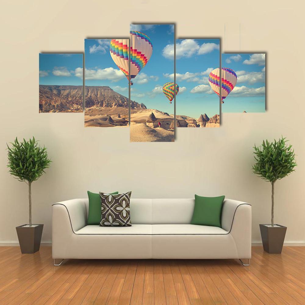 Hot Air Balloon Flying In Cappadocia Canvas Wall Art-5 Star-Gallery Wrap-62&quot; x 32&quot;-Tiaracle