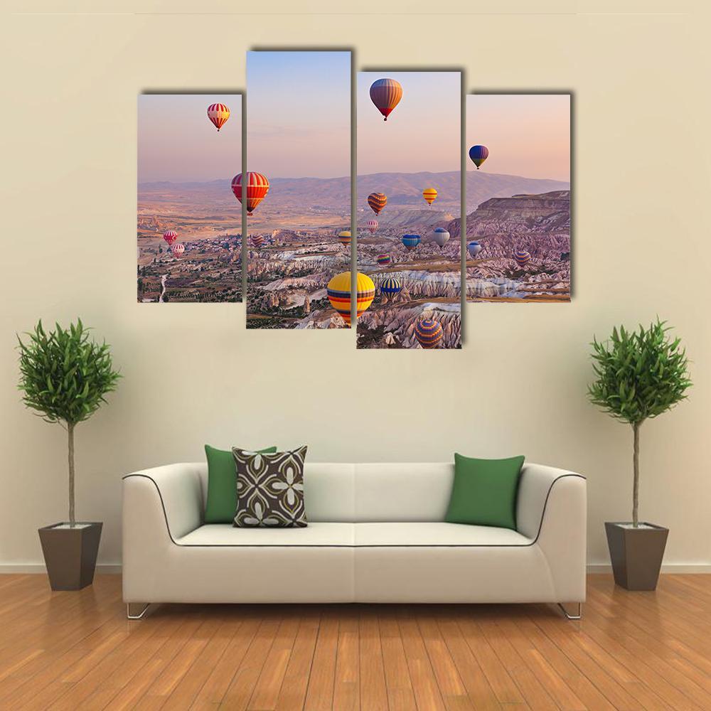 Hot Air Balloons Flying Over Rock Canvas Wall Art-4 Pop-Gallery Wrap-50" x 32"-Tiaracle