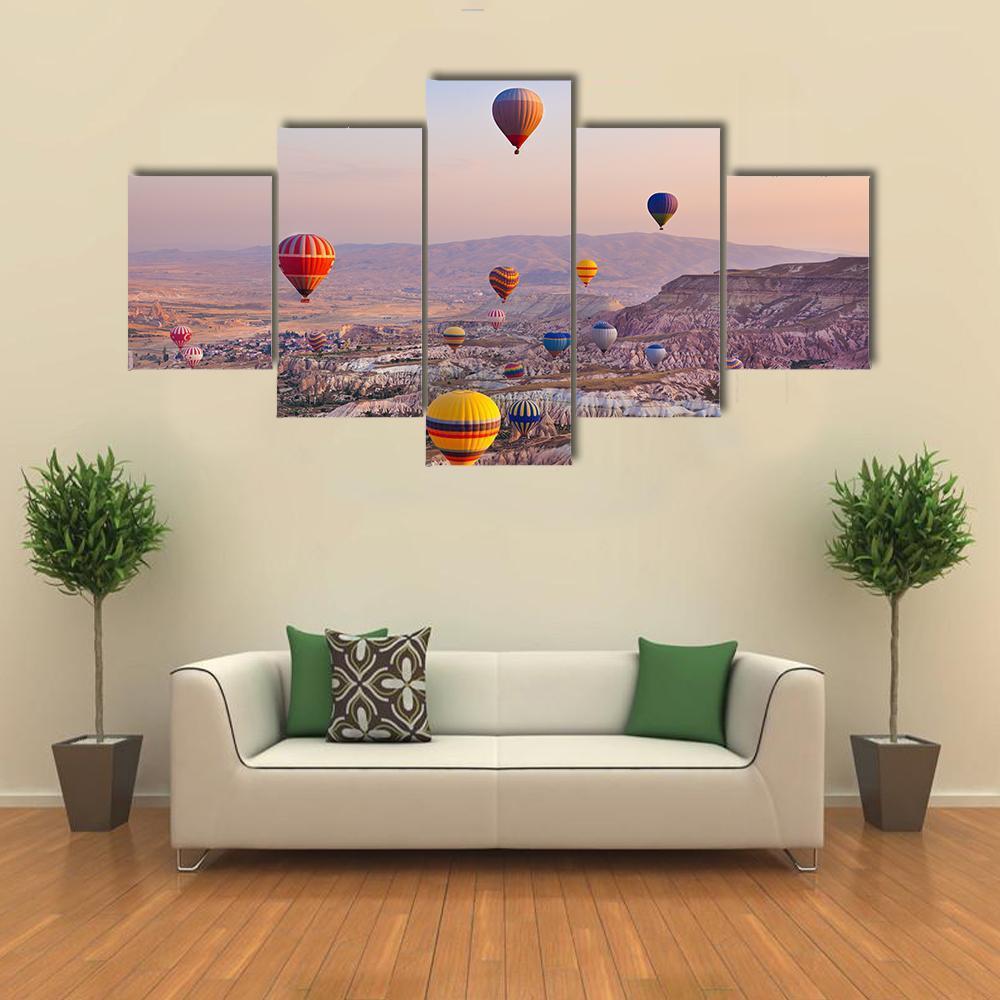 Hot Air Balloons Flying Over Rock Canvas Wall Art-5 Star-Gallery Wrap-62" x 32"-Tiaracle