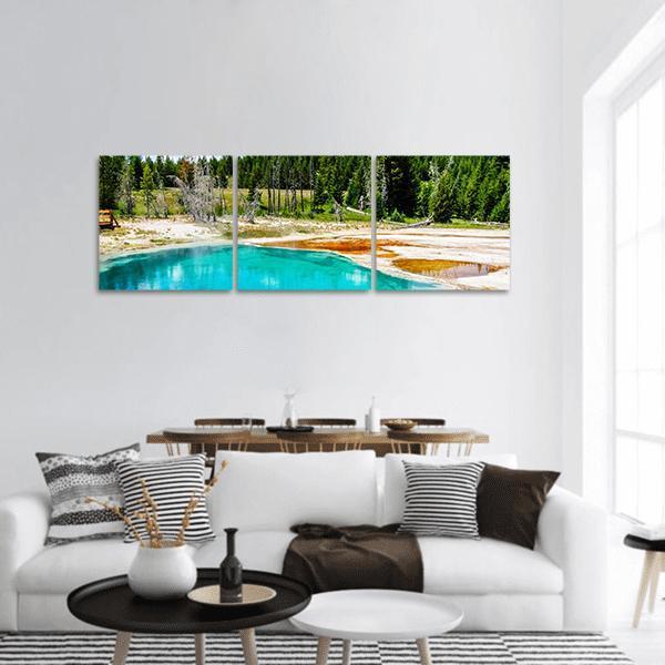 Yellowstone Hot Spring Landscape Panoramic Canvas Wall Art in orange, green and blue, hung on a wall
