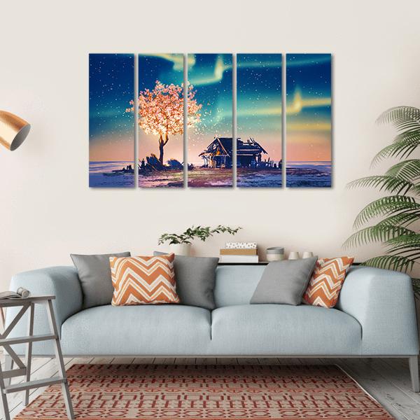 Weathered Shack and Glowing Tree Under Northern Lights Canvas Wall Art in blue, purple and pink, single panel hung on a wall