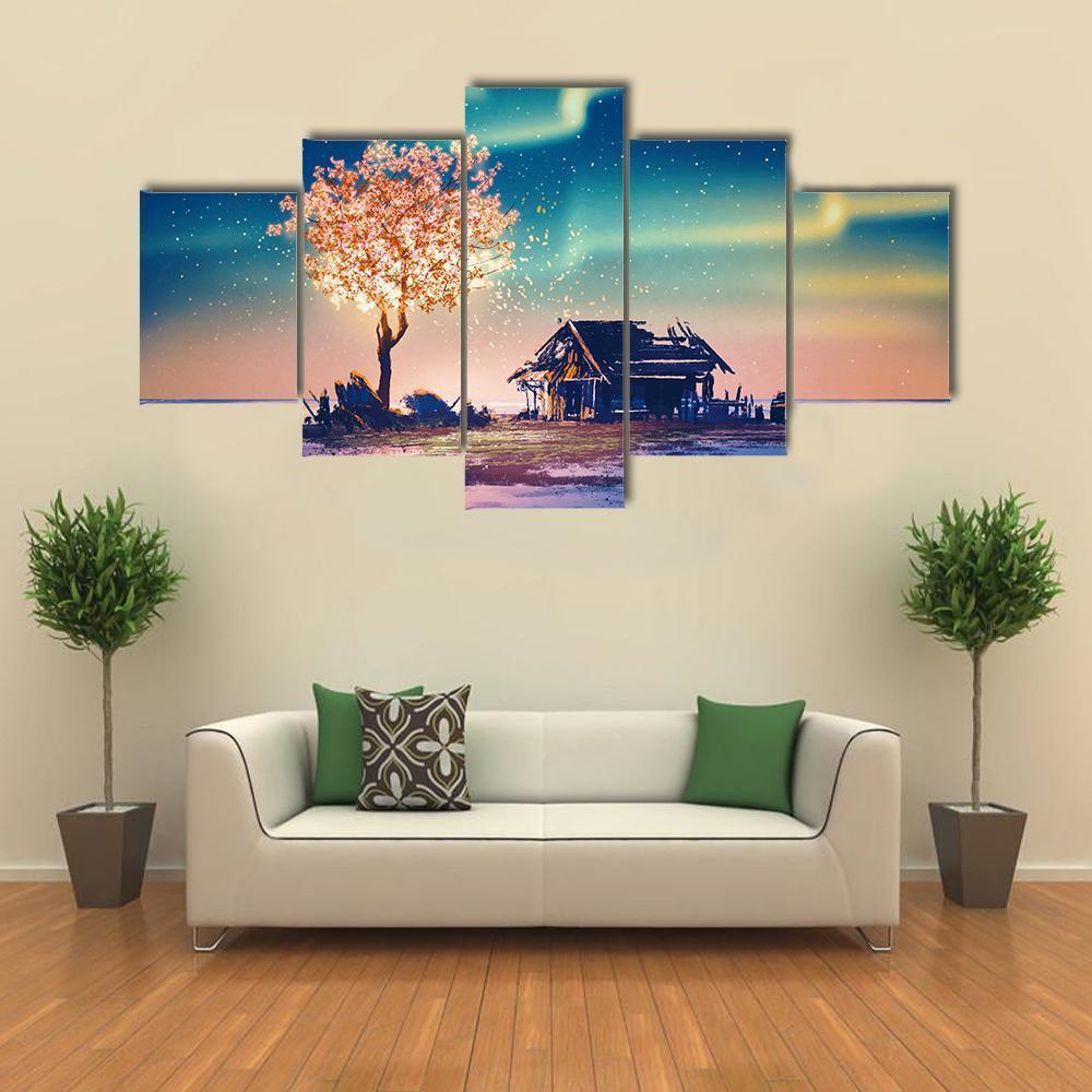 Weathered Hut with Glowing Tree Under Northern Lights Canvas Wall Art in yellow, blue and pink, 5 panel Star layout hung on a wall