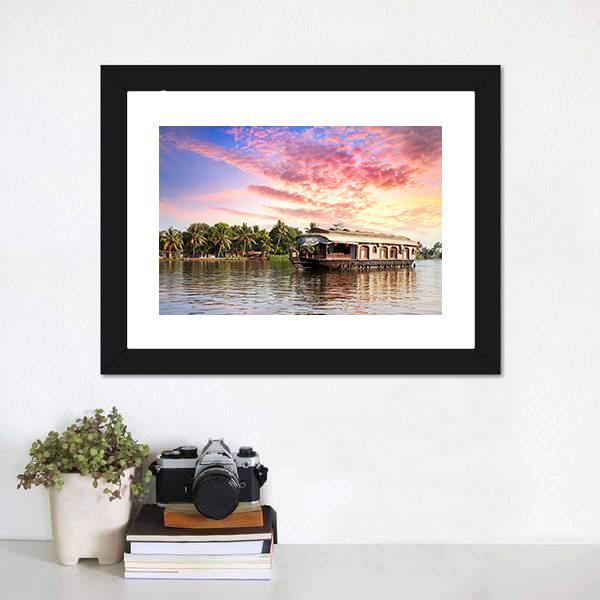 Kerala Houseboat at Sunset Canvas Wall Art in orange, blue and pink, framed print, product view on a white background