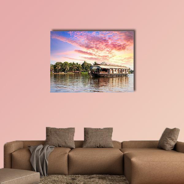 Kerala Houseboat at Sunset Canvas Wall Art in orange, blue and pink, single panel hung on a wall