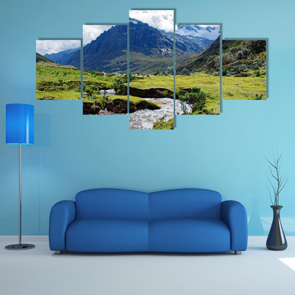 Huaraz Mountain Valley Landscape Canvas Wall Art in gray, green and blue, 5 panel Star layout hung on a wall
