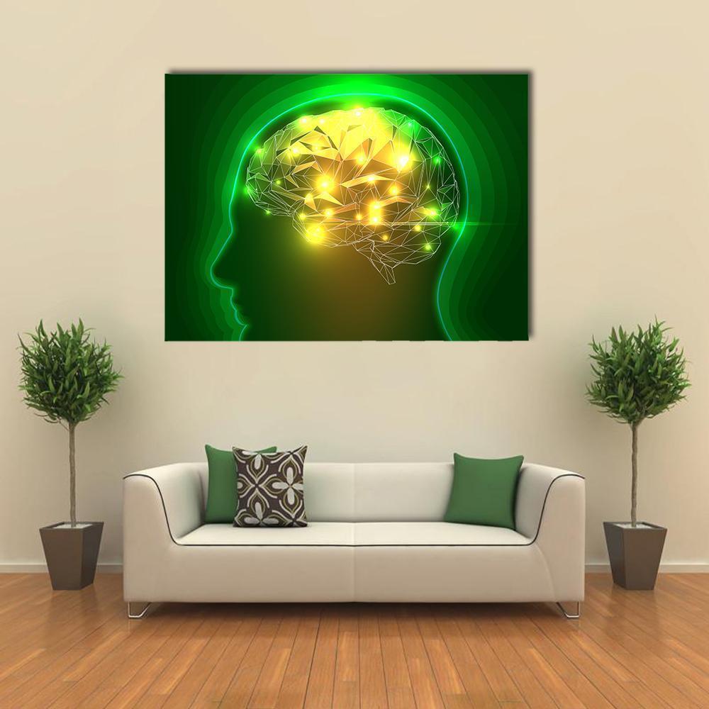Human Head Silhouette with Low-poly Brain Canvas Wall Art in yellow and green, single panel hung on a wall