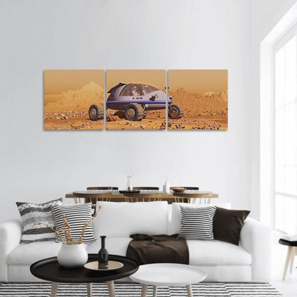 Three-wheeled Mars Rover with Astronauts Panoramic Canvas Wall Art in gray, brown and orange, hung on a wall