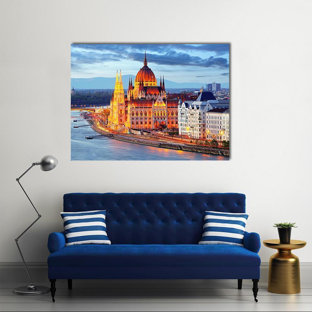 Hungarian Parliament Building at Dusk Canvas Wall Art in gold, orange and blue, single panel hung on a wall