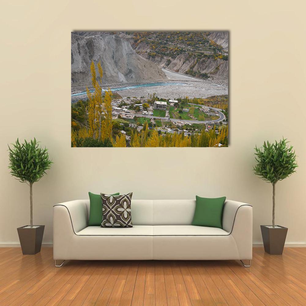 Hunza Valley Autumn River Landscape Canvas Wall Art in gray, yellow and green, single panel hung on a wall