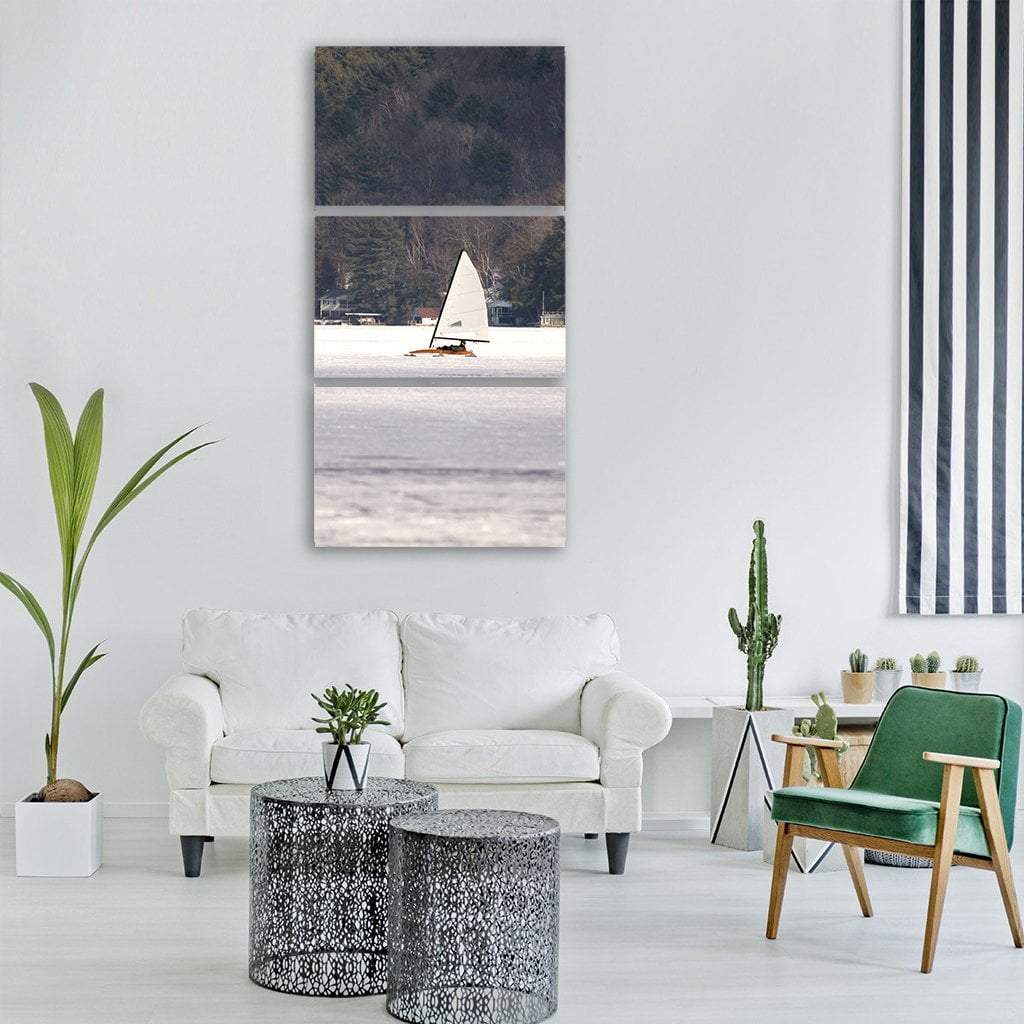 Iceboat Racing on Frozen Lake Vertical Canvas Wall Art in white, gray and brown, single vertical panel hung on a wall