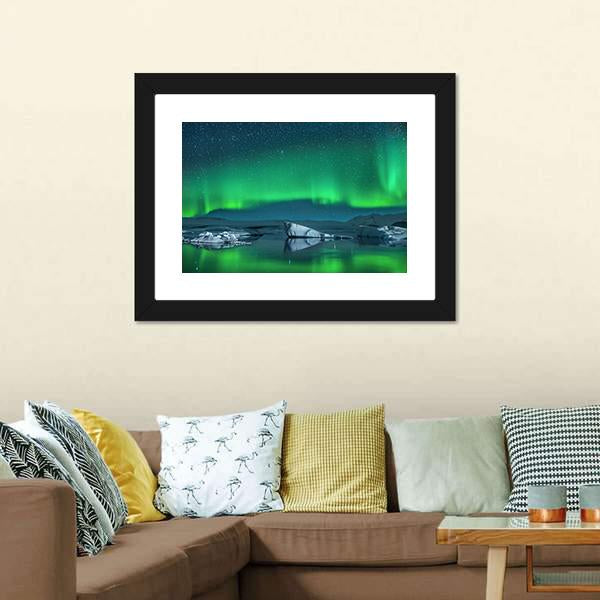 Icebergs Under Northern Lights Canvas Wall Art in green, blue and navy, 5 panel Star layout hung on a wall