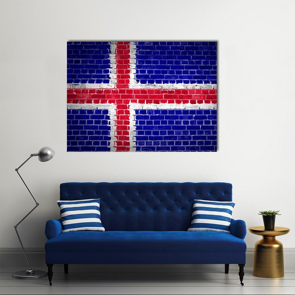 Icelandic Flag on Brick Canvas Wall Art in white, red and blue, single panel hung on a wall