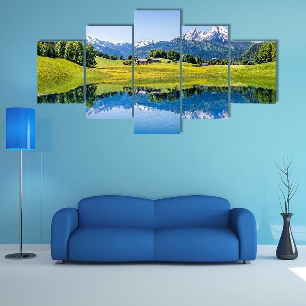 Summer Lake with Snow-capped Mountains Canvas Wall Art in white, green and blue, 5 panel Star layout hung on a wall