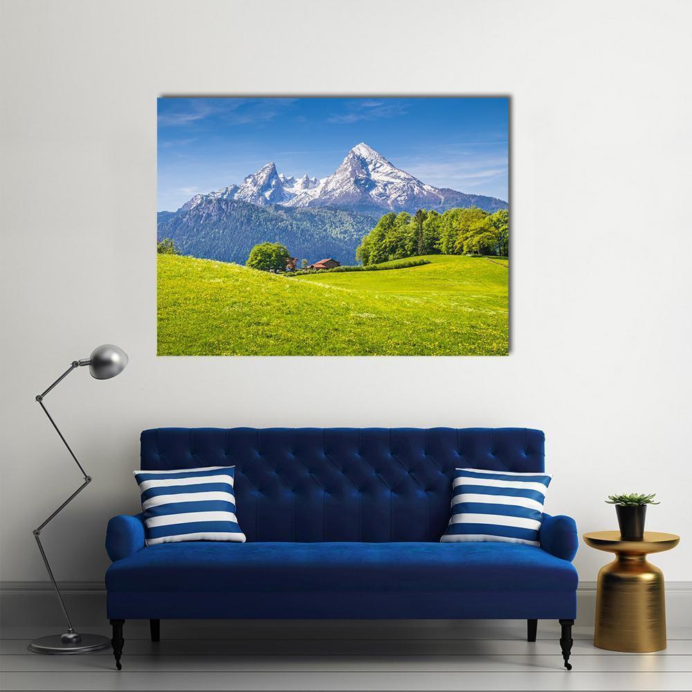 Idyllic Alpine Landscape Canvas Wall Art in white, green and blue, single panel hung on a wall