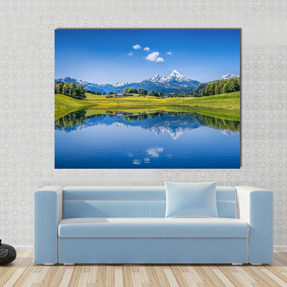 Idyllic Summer Landscape Canvas Wall Art in green and blue, single panel hung on a wall