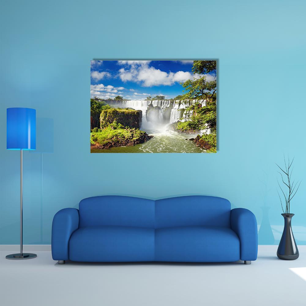 Iguassu Falls Waterfall Canvas Wall Art in white, green and blue, single panel hung on a wall
