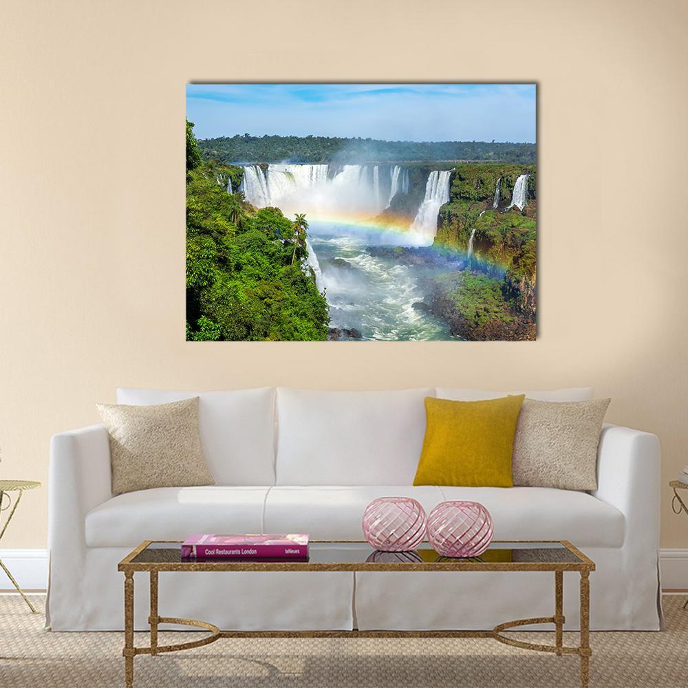 Iguazu Falls with Double Rainbow Canvas Wall Art in white, green and blue, single panel hung on a wall
