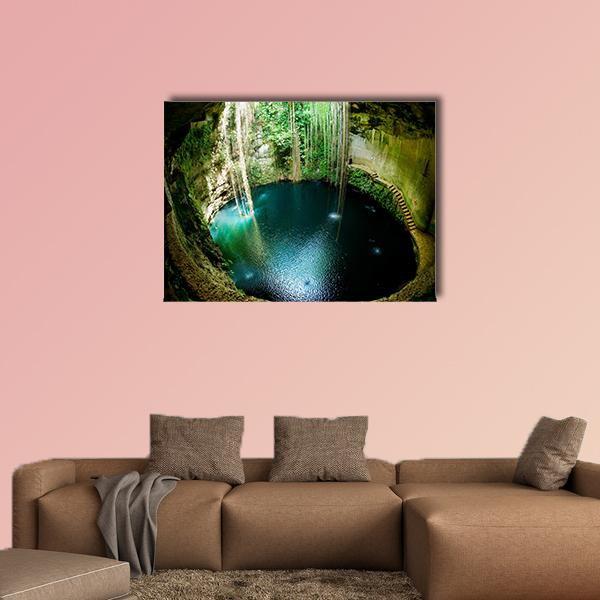 Ik-kil Cenote, Mexico Canvas Wall Art in brown, green and blue, single panel hung on a wall