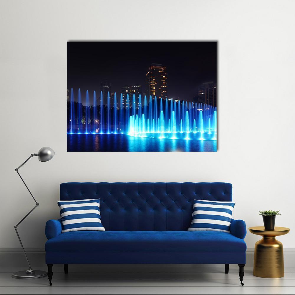 Kuala Lumpur Illuminated Fountains Canvas Wall Art in black and blue, single panel hung on a wall