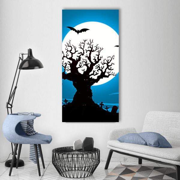 Gnarled Tree Moon Graveyard Illustration Vertical Canvas Wall Art in black, white and blue, single vertical panel hung on a wall