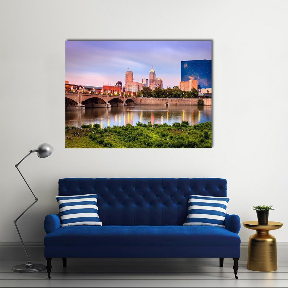 Indianapolis Skyline at Sunset Canvas Wall Art in orange, blue and purple, single panel hung on a wall