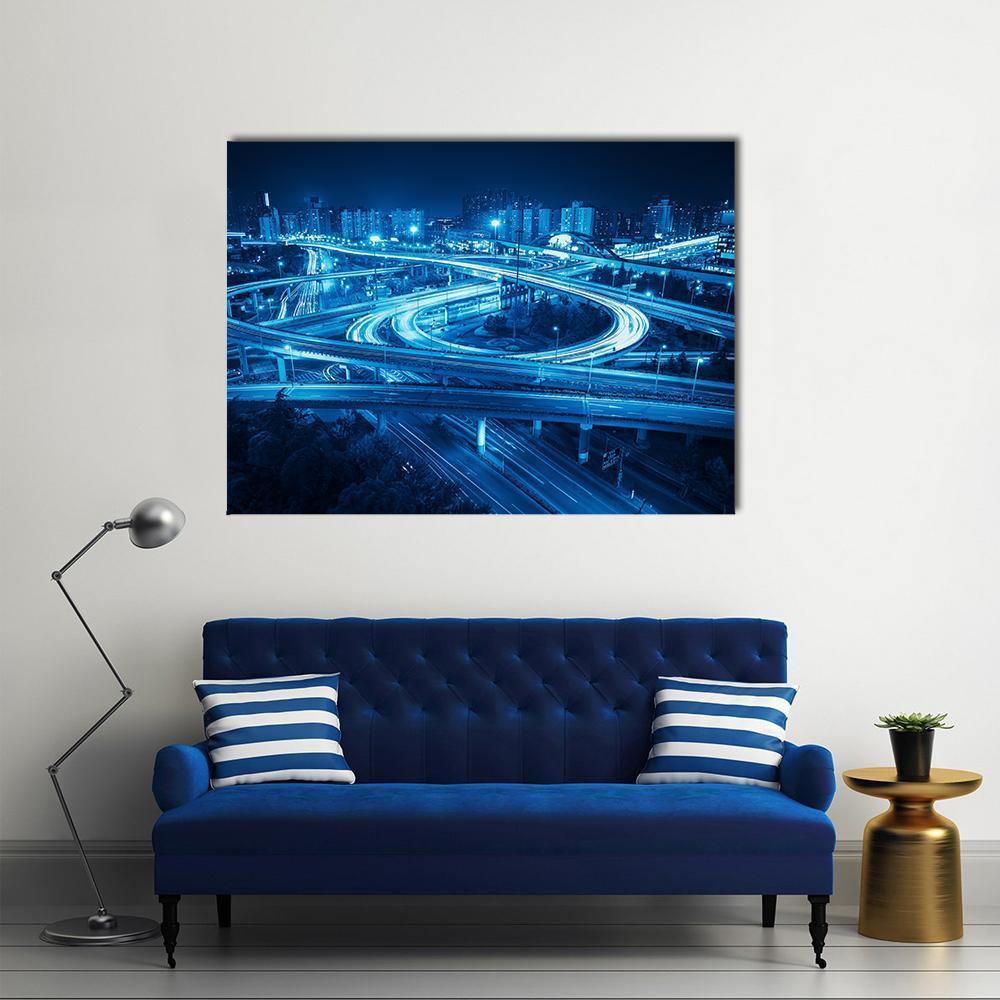Shanghai Night Highway Interchange Canvas Wall Art in black, blue and navy, single panel hung on a wall