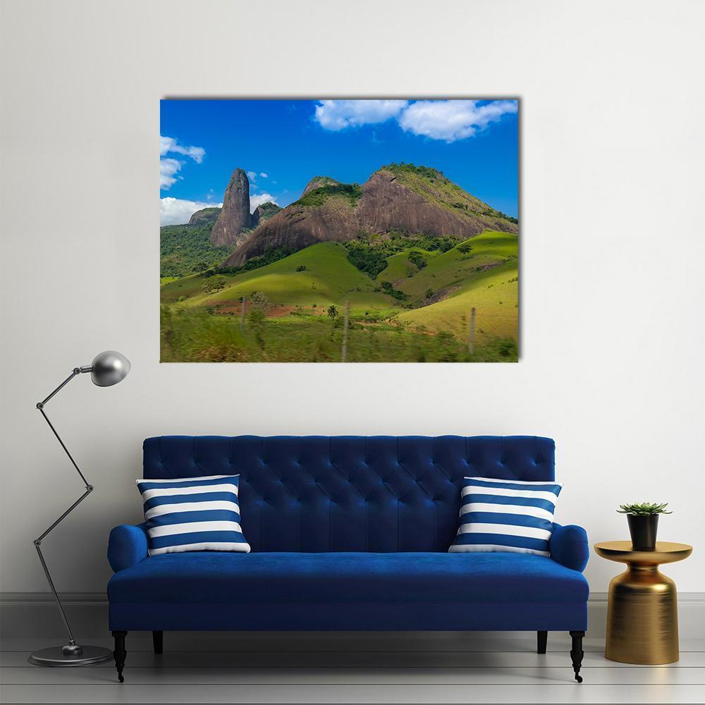 Itabira Peak and Rolling Hills Canvas Wall Art in brown, green and blue, single panel hung on a wall