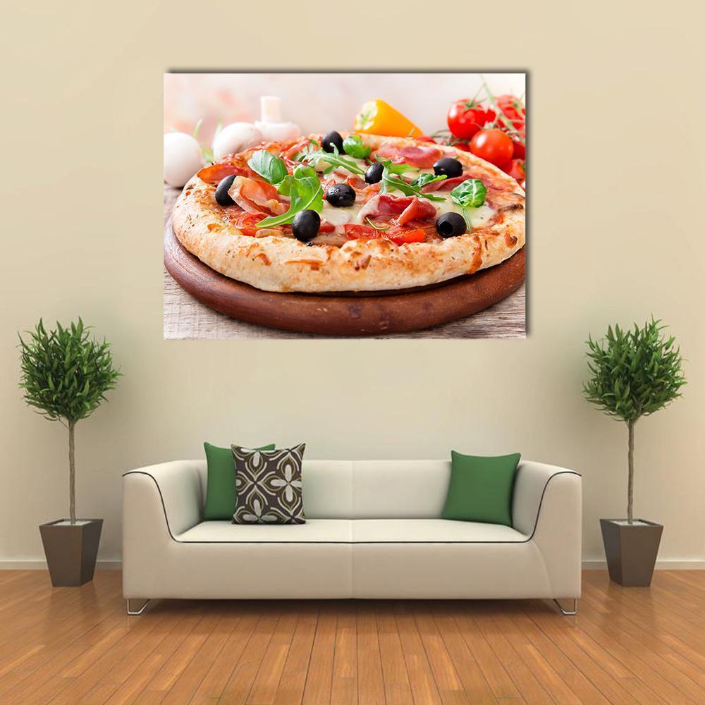 Italian Pizza with Prosciutto and Arugula Canvas Wall Art in beige, brown and red, single panel hung on a wall