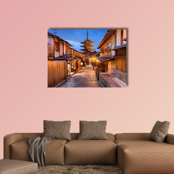 Yasaka Pagoda Temple at Dusk Canvas Wall Art in brown, orange and blue, single panel hung on a wall