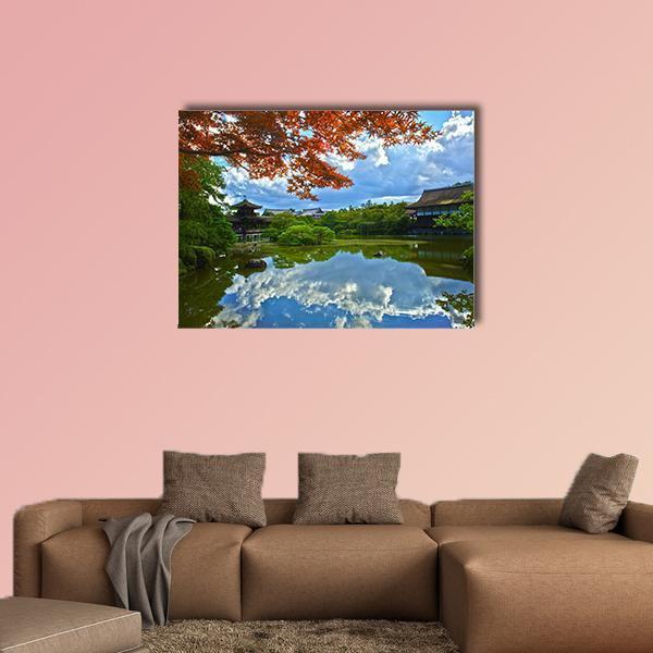 Japanese Garden with Autumn Pond Reflection Canvas Wall Art in orange, green and blue, single panel hung on a wall