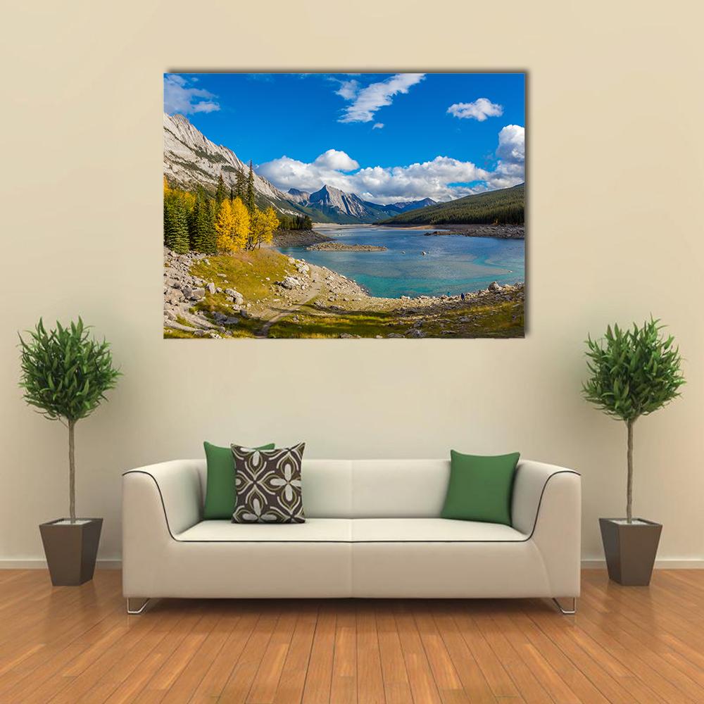 Jasper National Park Turquoise Lake and Larch Trees Canvas Wall Art in gray, green and blue, single panel hung on a wall