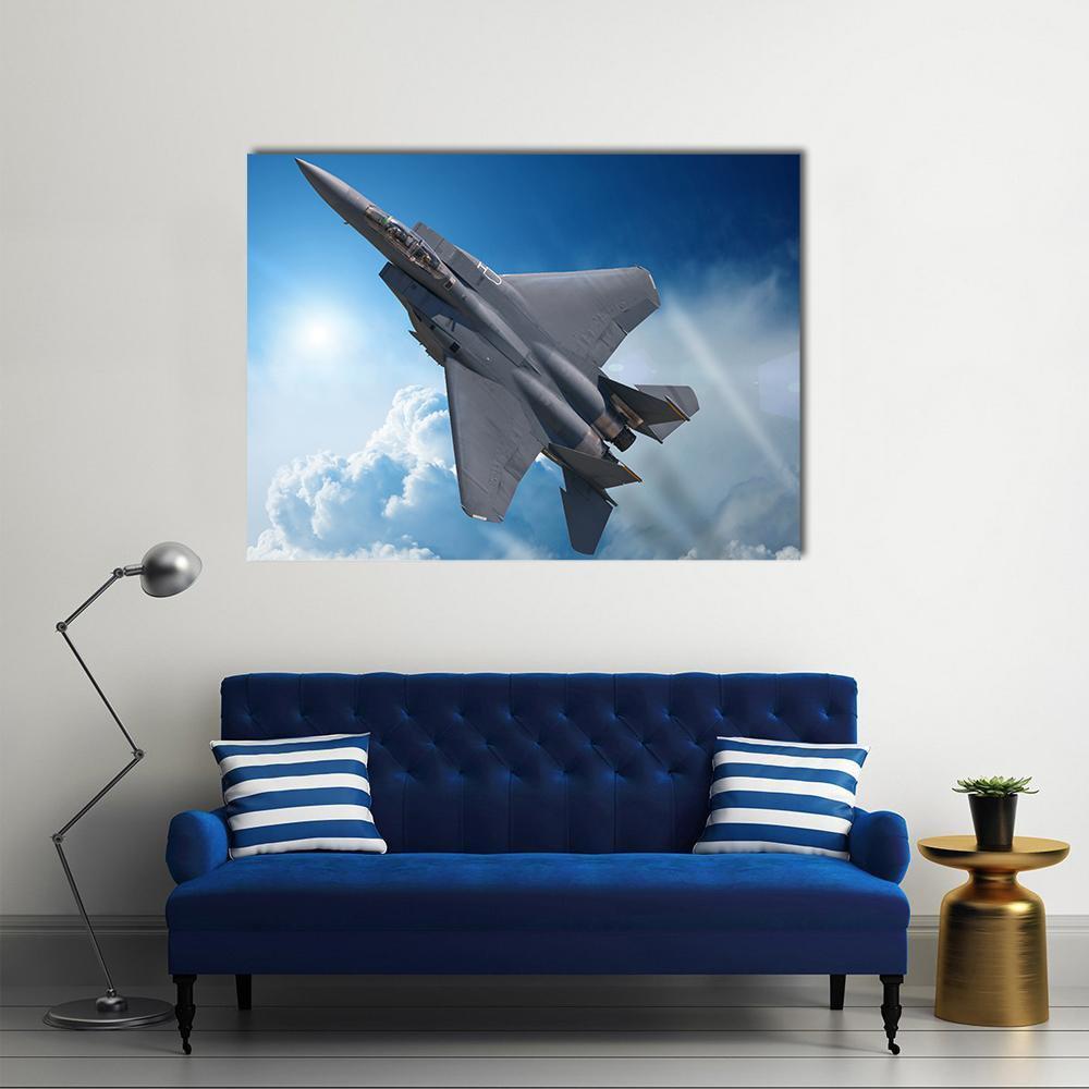 F-15 Fighter Jet in Flight Canvas Wall Art in white, gray and blue, single panel hung on a wall