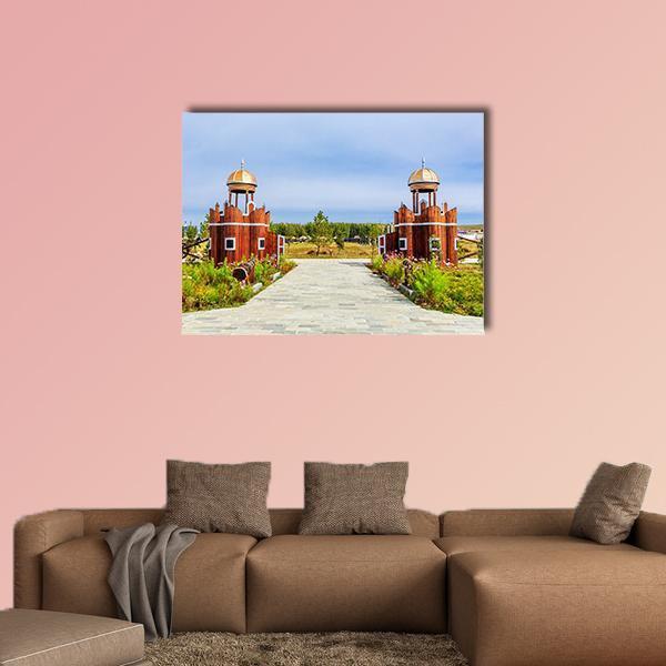 Jingbei Grassland Khan Palace Canvas Wall Art in brown, green and blue, single panel hung on a wall