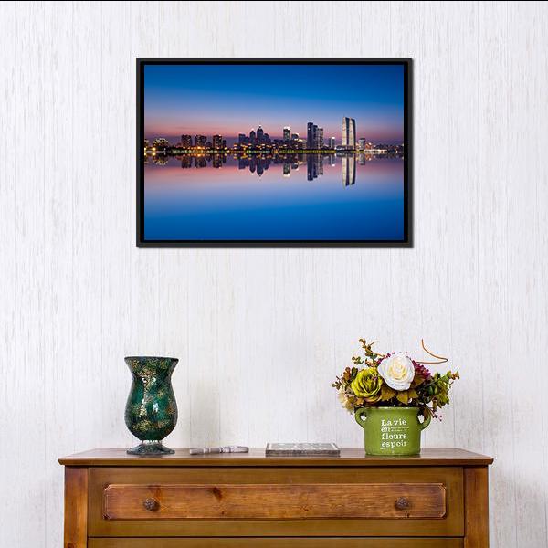 Jinji Lake Skyline at Dusk Canvas Wall Art in blue, purple and pink, framed canvas, product view on a white background