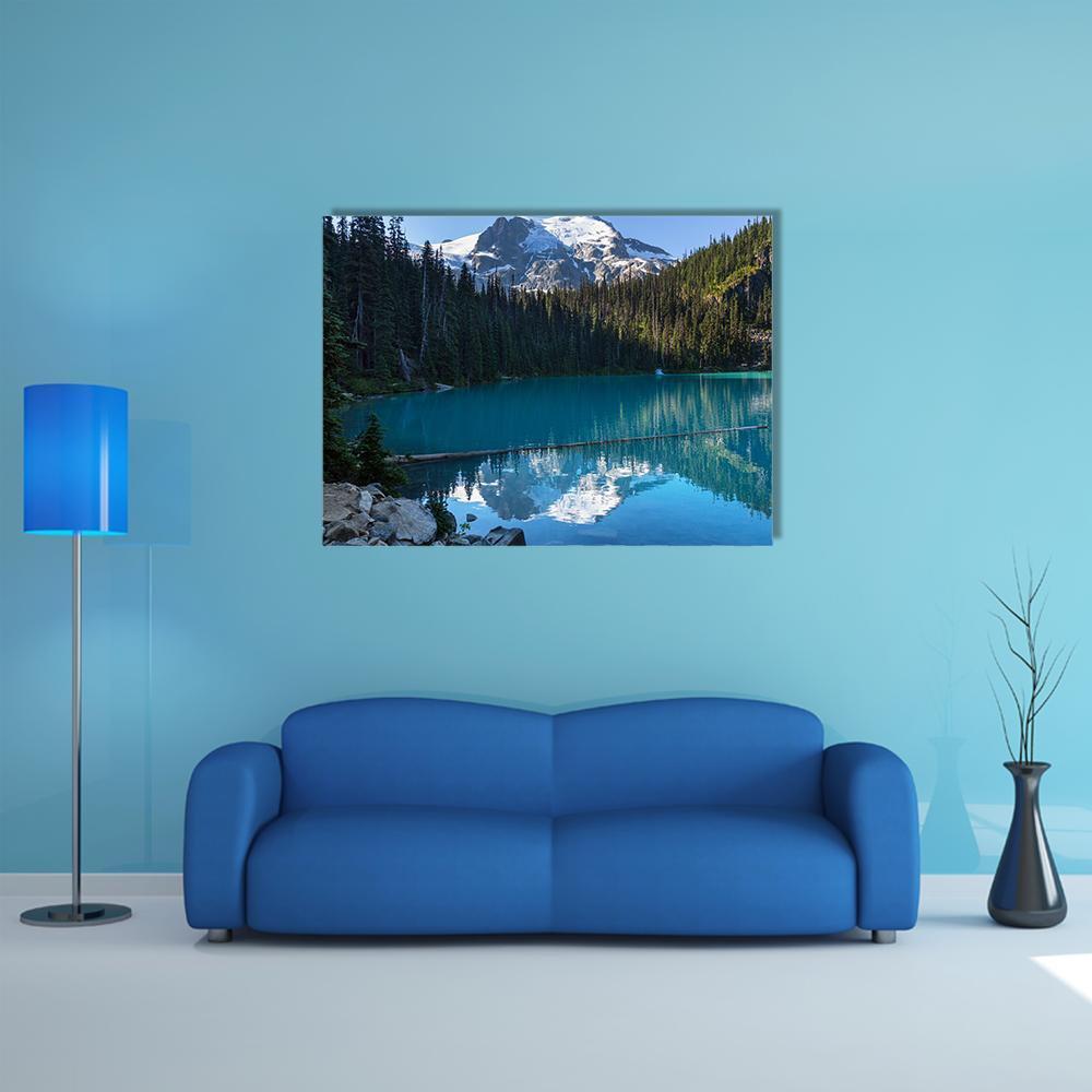 Joffre Lake Mountain Reflection Canvas Wall Art in white, green and blue, single panel hung on a wall