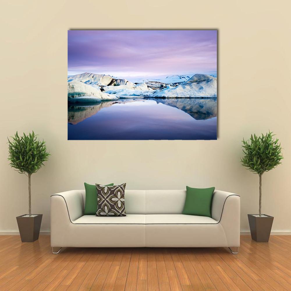 Jokulsarlon Glacier Lagoon Iceberg Reflection Canvas Wall Art in white, blue and purple, single panel hung on a wall