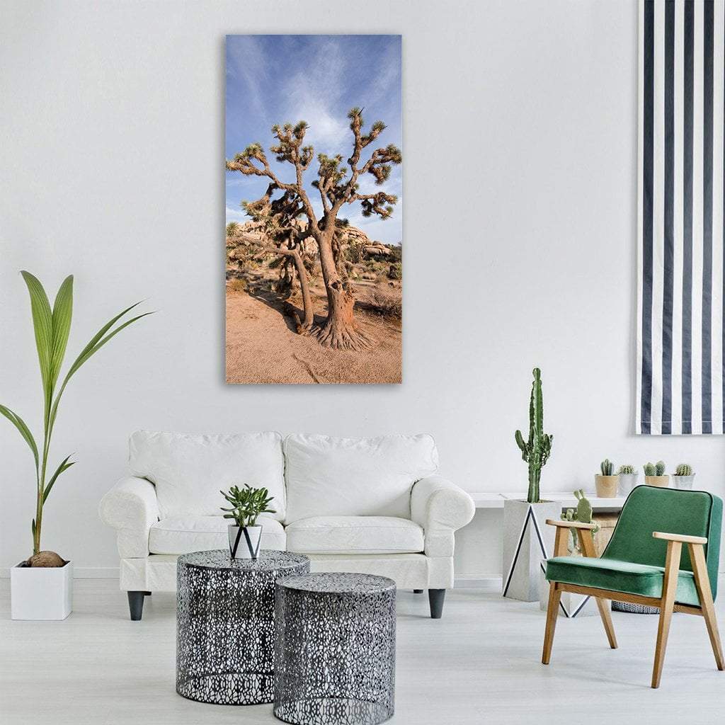 Joshua Tree National Park Landscape Vertical Canvas Wall Art in beige, brown and blue, single vertical panel hung on a wall