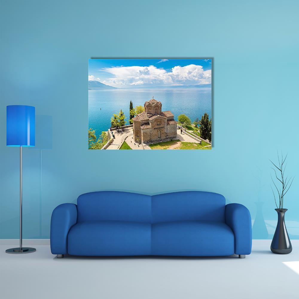 Jovan Kaneo Church Overlooking Ohrid Lake Canvas Wall Art in brown, green and blue, single panel hung on a wall