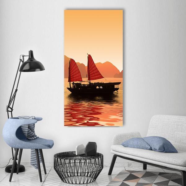 Junk Boat in Vietnam at Sunset Vertical Canvas Wall Art in red, orange and yellow, single vertical panel hung on a wall