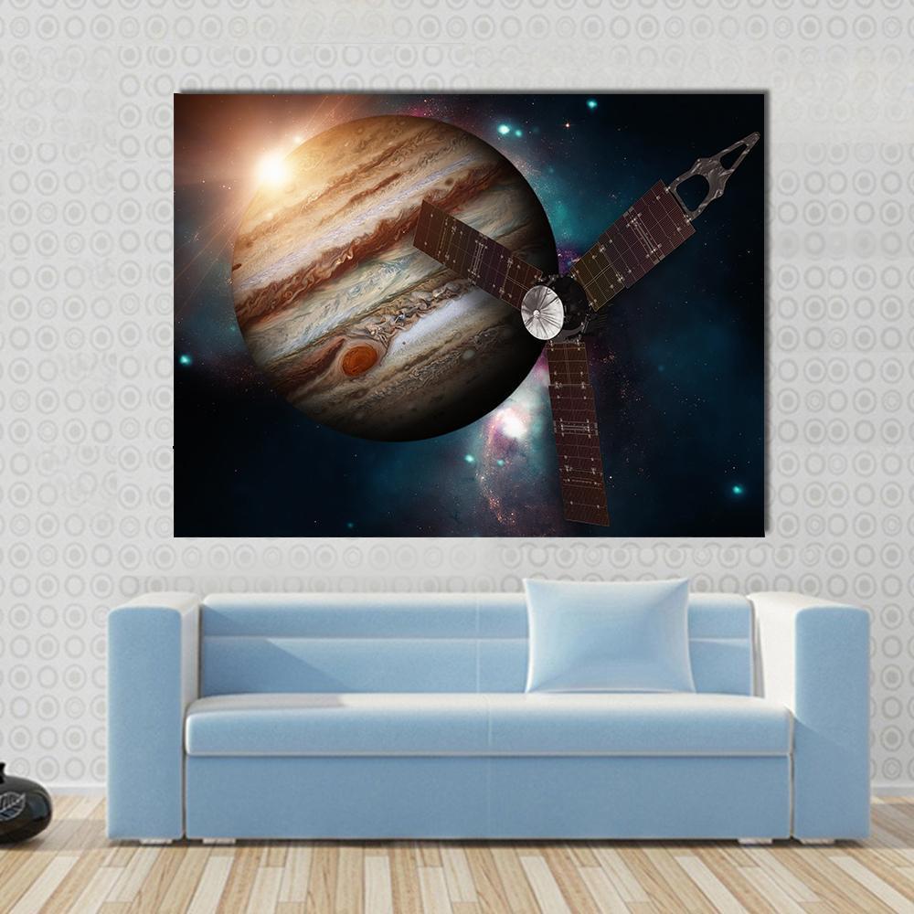 Juno Spacecraft &amp; Jupiter Canvas Wall Art in black, brown and orange, single panel hung on a wall
