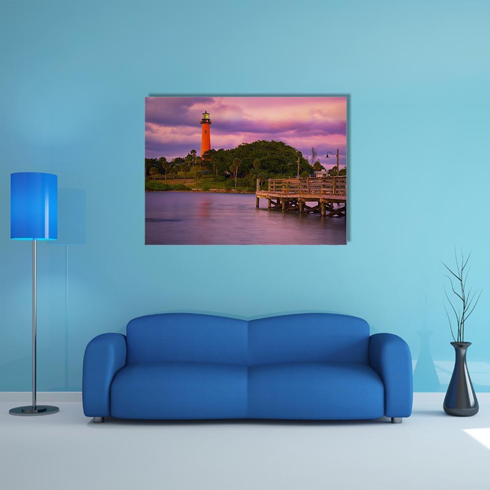Jupiter Inlet Lighthouse at Dusk Canvas Wall Art in orange, purple and pink, single panel hung on a wall