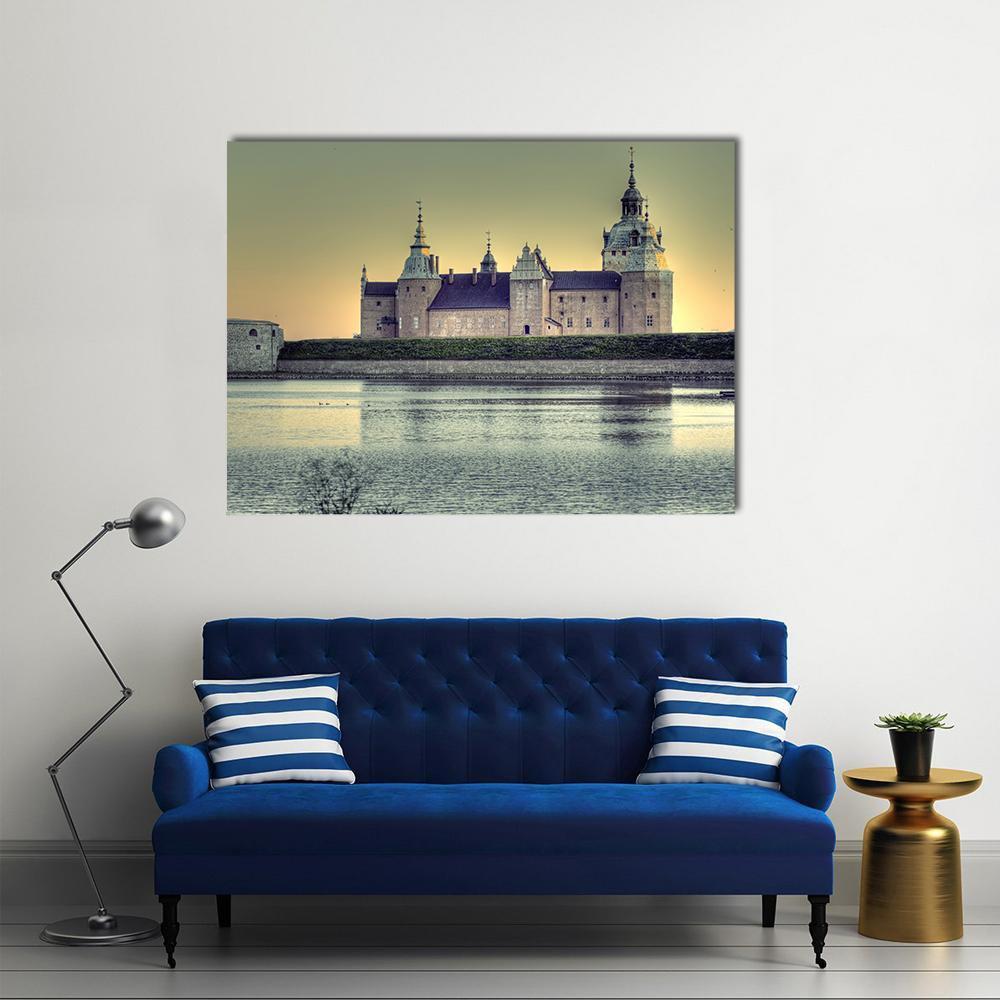 Kalmar Castle at Golden Hour Canvas Wall Art in beige, yellow and blue, single panel hung on a wall
