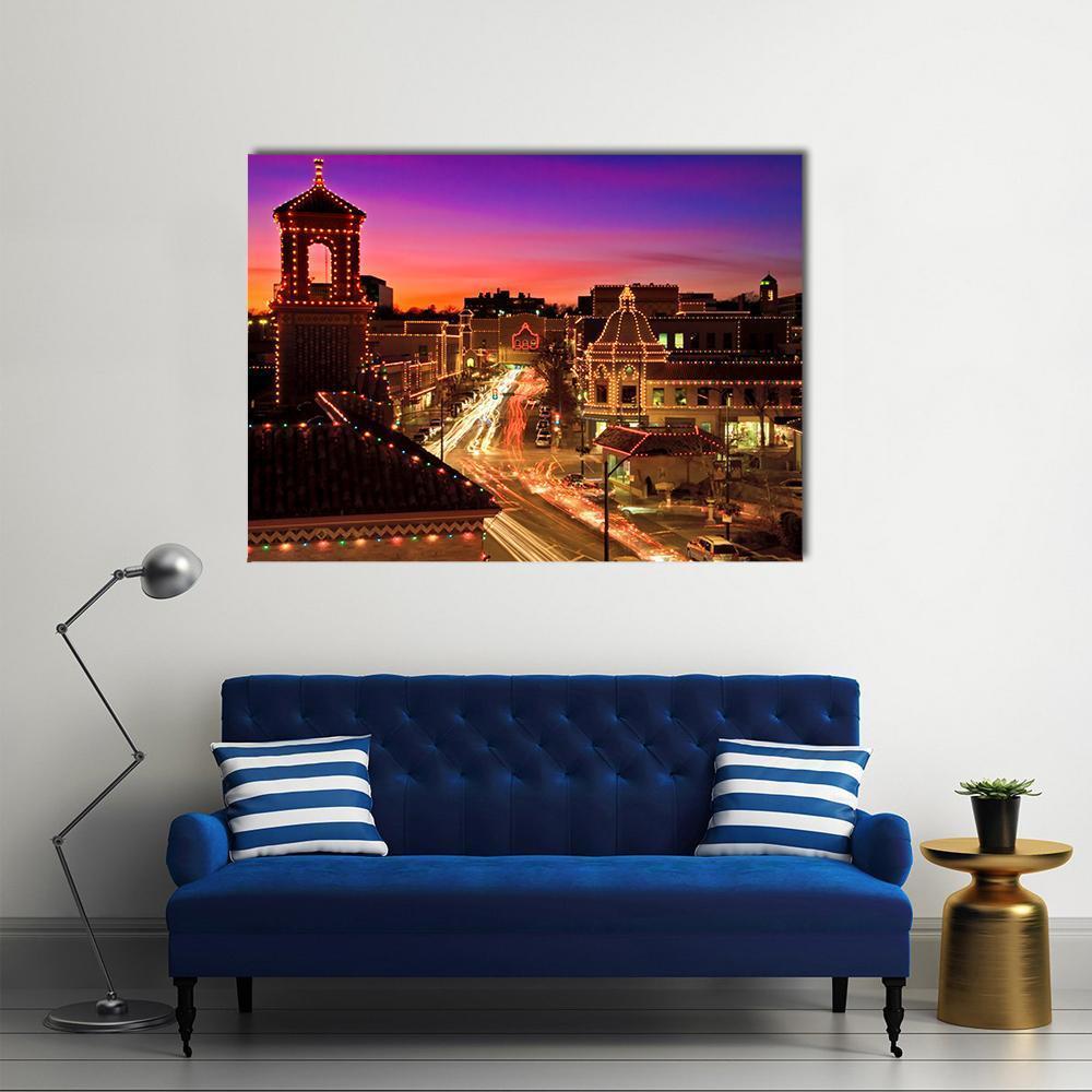 Kansas City Plaza Christmas Lights Canvas Wall Art in black, orange and purple, single panel hung on a wall