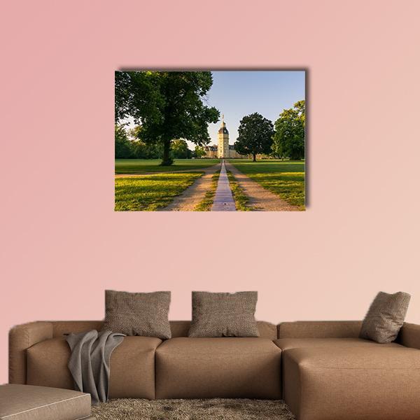 Karlsruhe Palace Tree-lined Path Canvas Wall Art in brown, green and blue, single panel hung on a wall